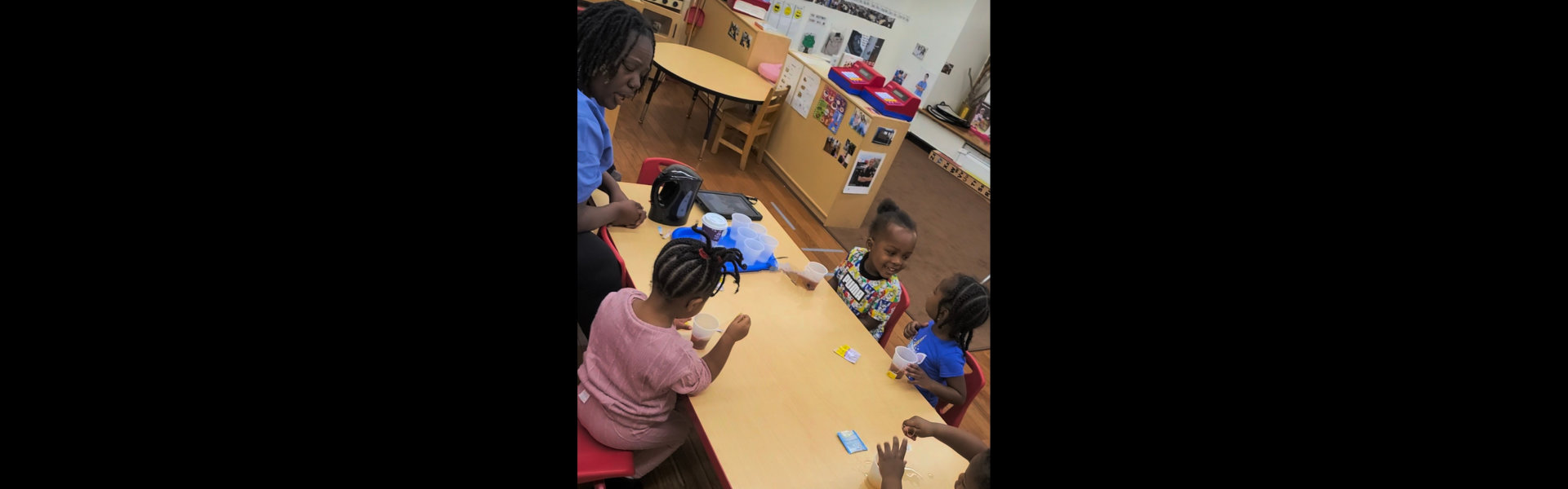 kids playing with teacher